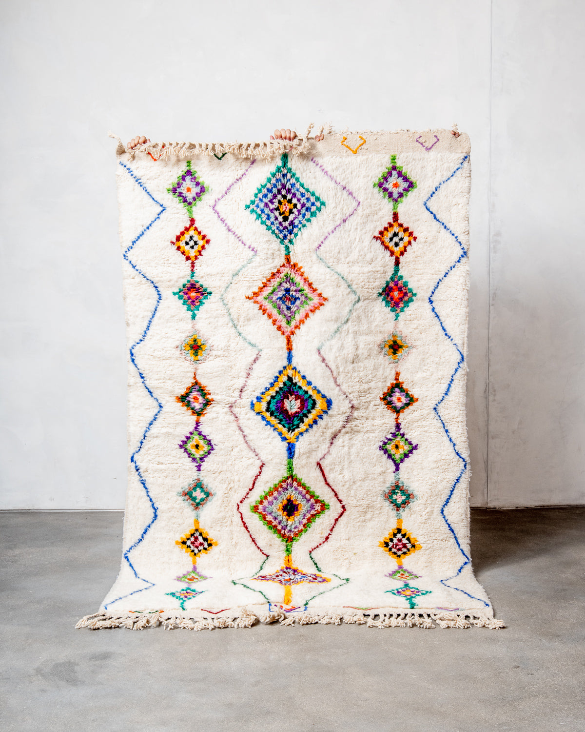 Modern, designer, handcrafted Berber rug from Morocco. Beniourain carpet with beautiful colours and patterns and fluffy wool texture.